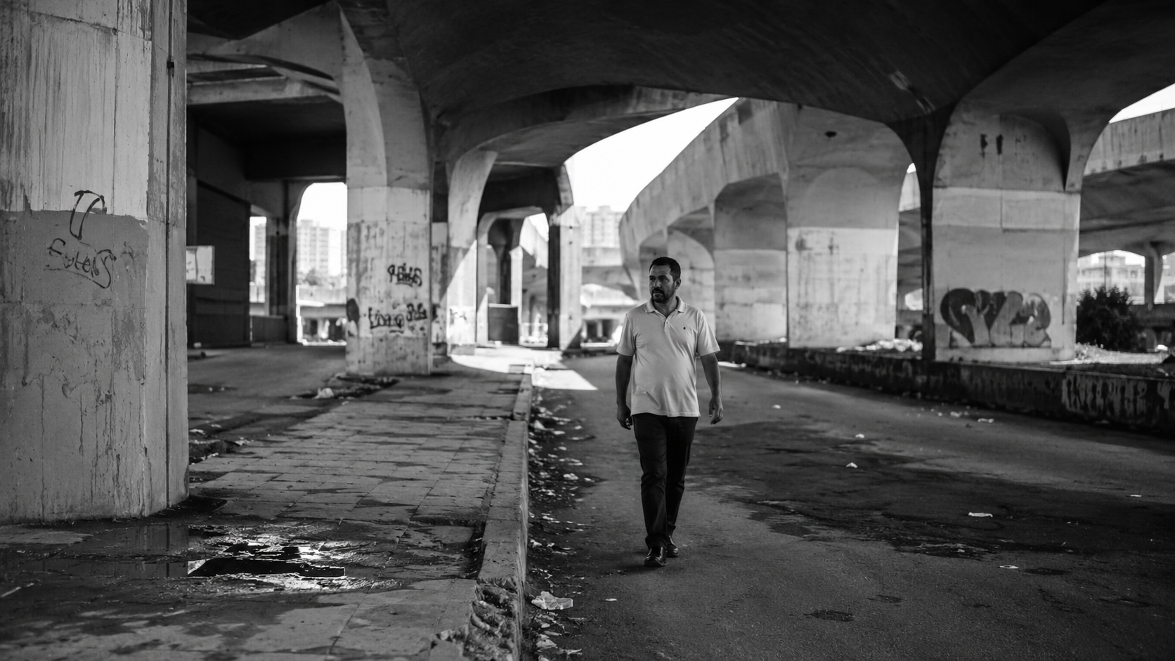 Camera-Grade Black and White Street Photography: Photo-Realism Under an Urban Bridge