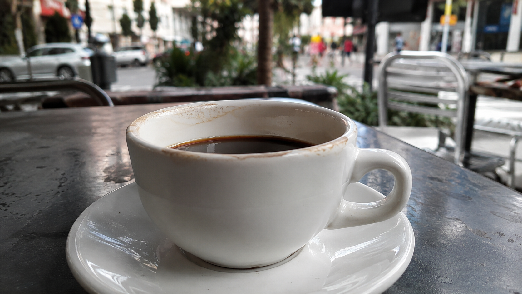 Photo-Realism Calibration: Reconstructing an Outdoor Coffee Cup Scene Beyond Default AI Aesthetics